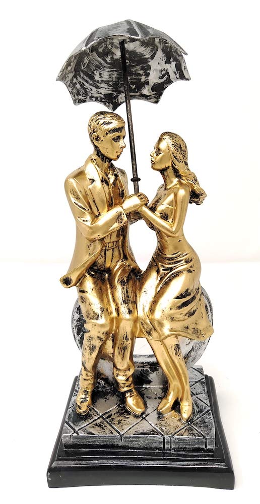 Love Couple Pair Sitting on Heart Carrying Umbrella Figurine (Golden, Height 11 in X Length 5 in)