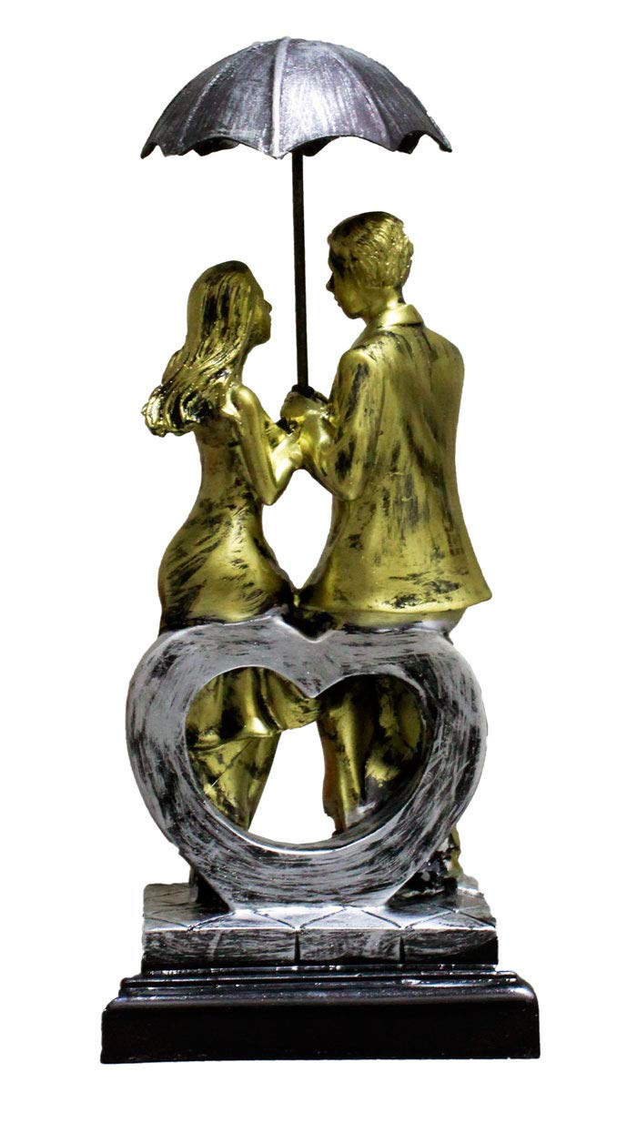 Love Couple Sitting on Heart Carrying Umbrella Figurine (Golden, Height 11 in X Length 5 in)